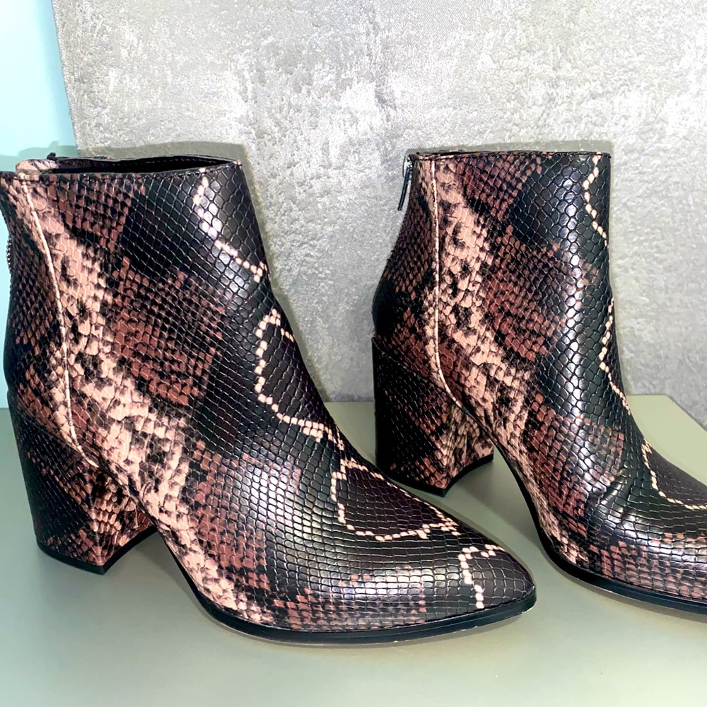 Steve Madden Snake Printed Booties.